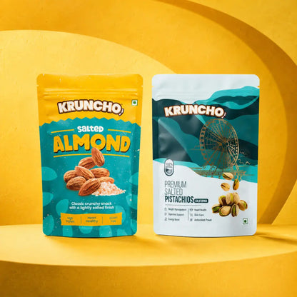 Kruncho Salted Almonds and Premium Salted Pistachios pouches displayed side-by-side against a minimalist, bright yellow architectural background.